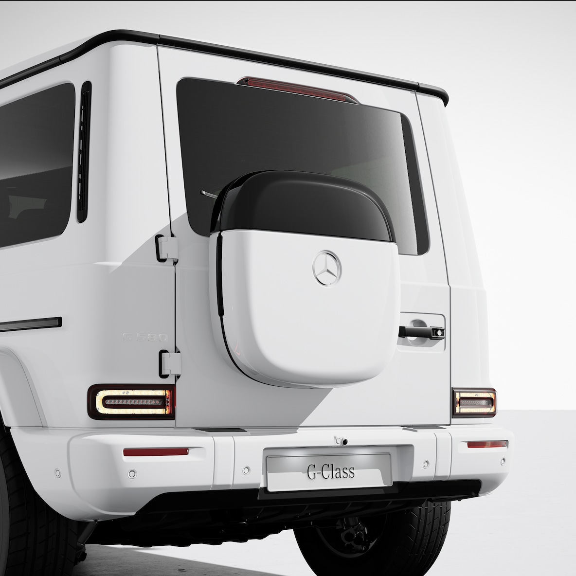 A caixa de design na porta lateral traseira de um Mercedes-Benz G 580 com tecnologia EQ.