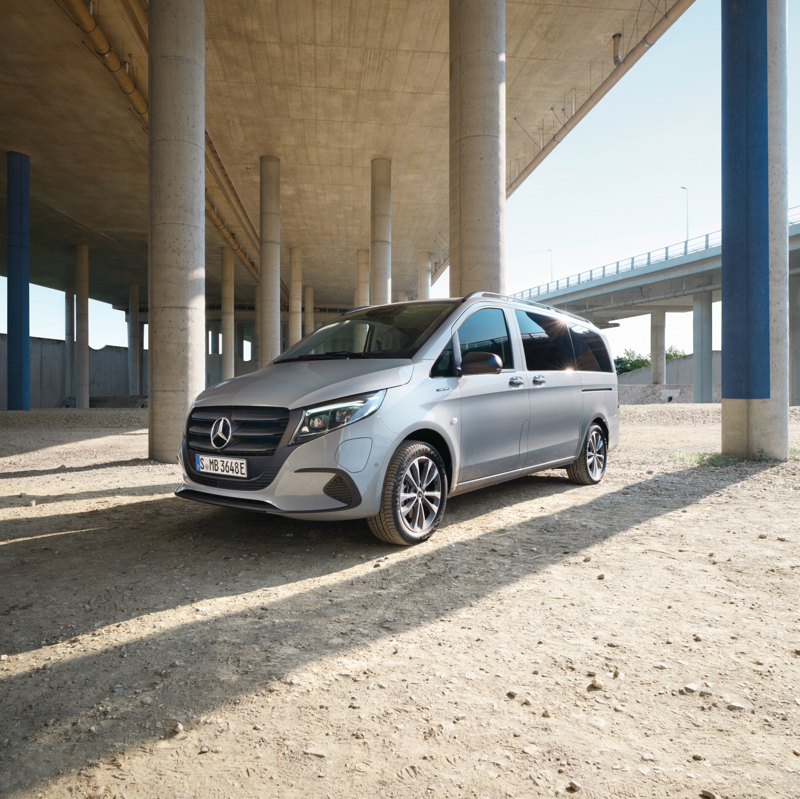 The eVito Tourer standing under a bridge.