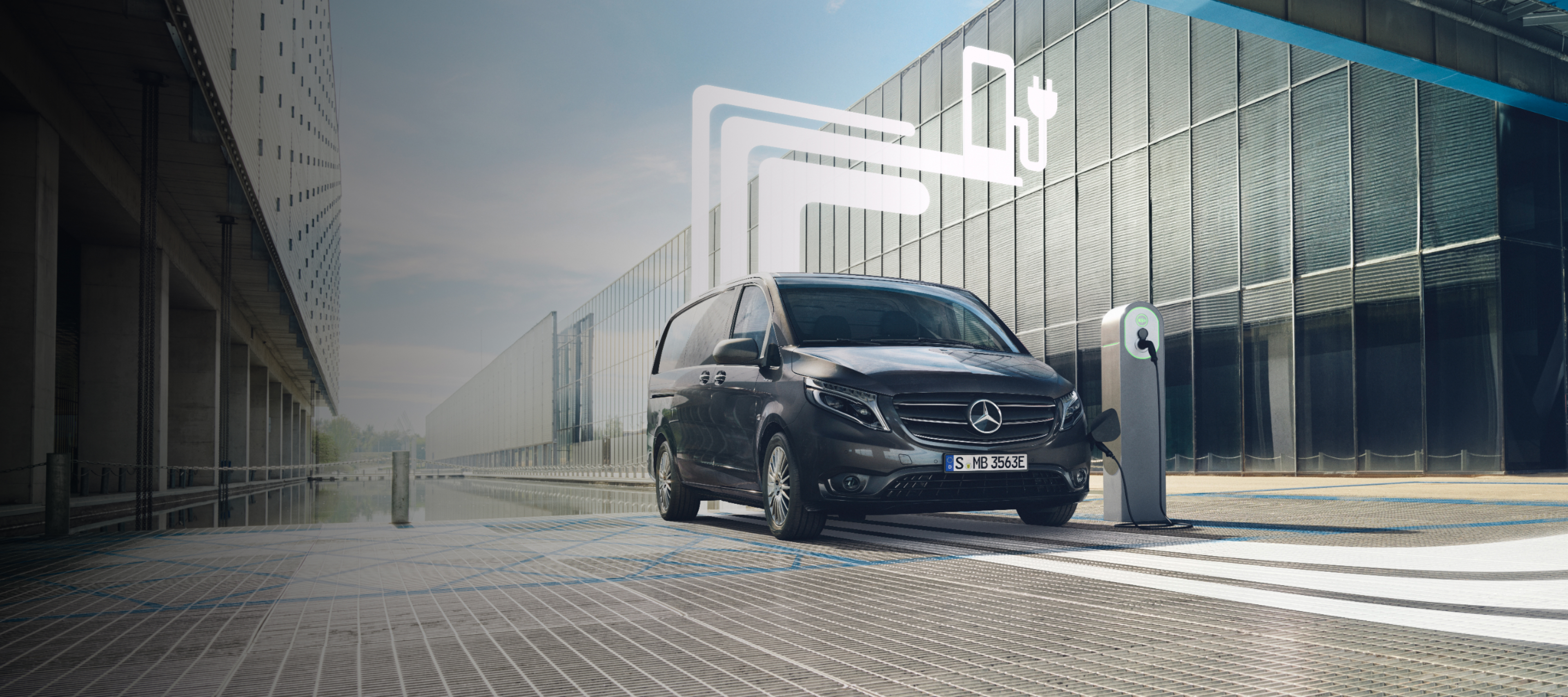 Mobilidade elétrica | Funcionalidades digitais extras | Mercedes-Benz Um veículo comercial ligeiro Mercedes-Benz com elementos gráficos que representam as funcionalidades digitais extras.