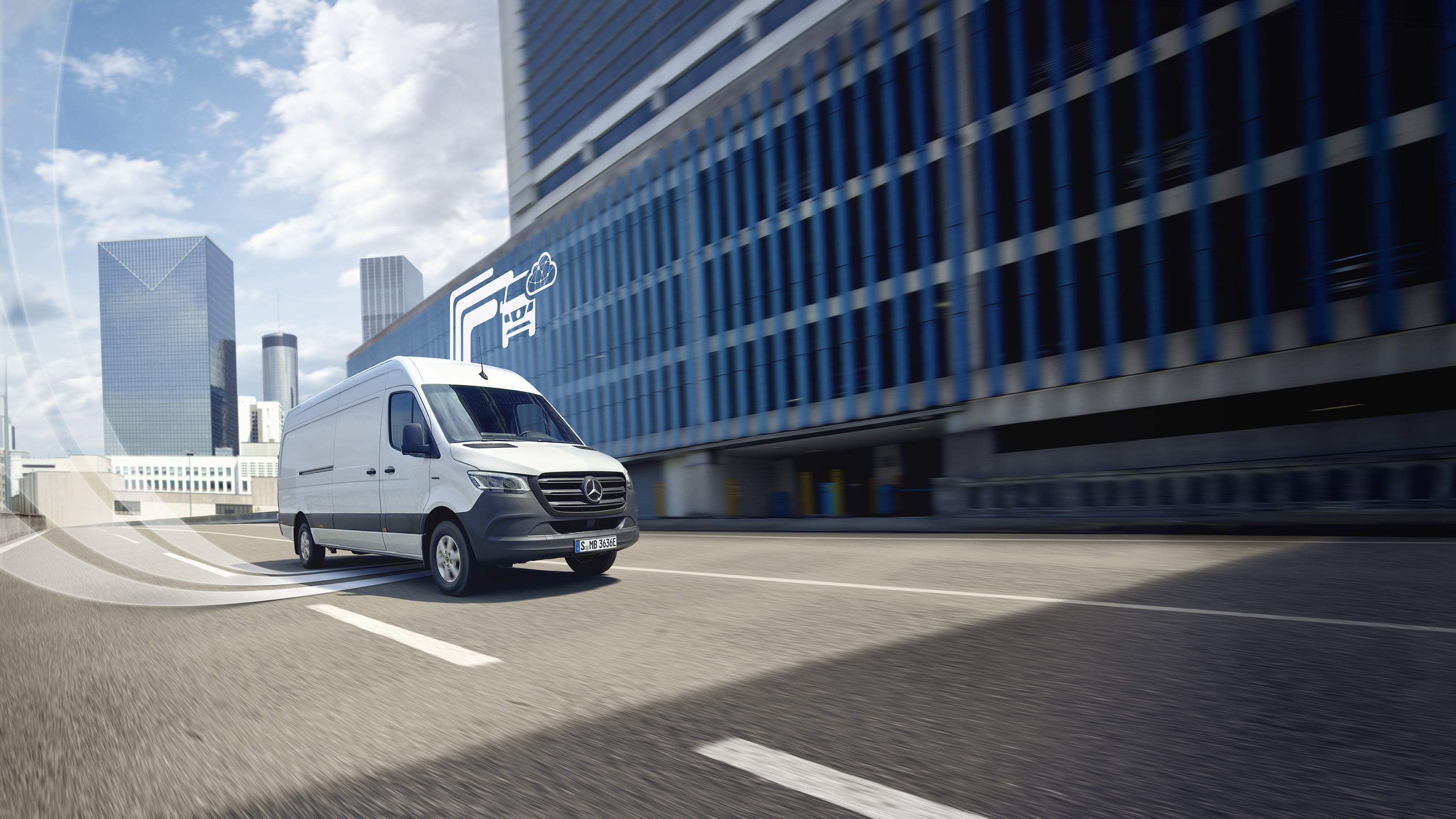 Funcionalidades digitais extras | Mercedes-Benz Um veículo comercial ligeiro Mercedes-Benz com elementos gráficos que representam as funcionalidades digitais extras.